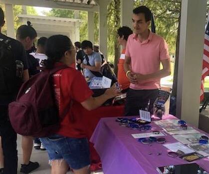 Christian Castro tabling for Scholarship page
