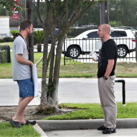 Man talking to male client at PP Resized (2)