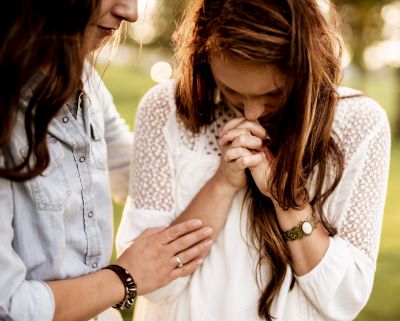 Two women praying